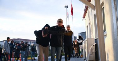 Police escort captured suspects as they are taken to a hospital for a medical check, in Istanbul, Türkiye, Jan. 4, 2024. (AA Photo) 