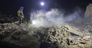 Ukrainian rescuers work at the site of a missile attack in the Pokrovsk district, Donetsk region, Ukraine, Jan. 6, 2024. (EPA Photo)