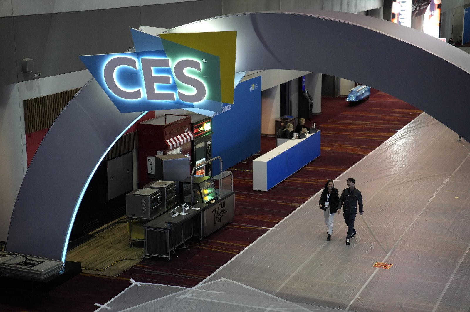 People walk through the Las Vegas Convention Center during setup ahead of the CES tech show, in Las Vegas, U.S., Jan. 6, 2024. (AP Photo)