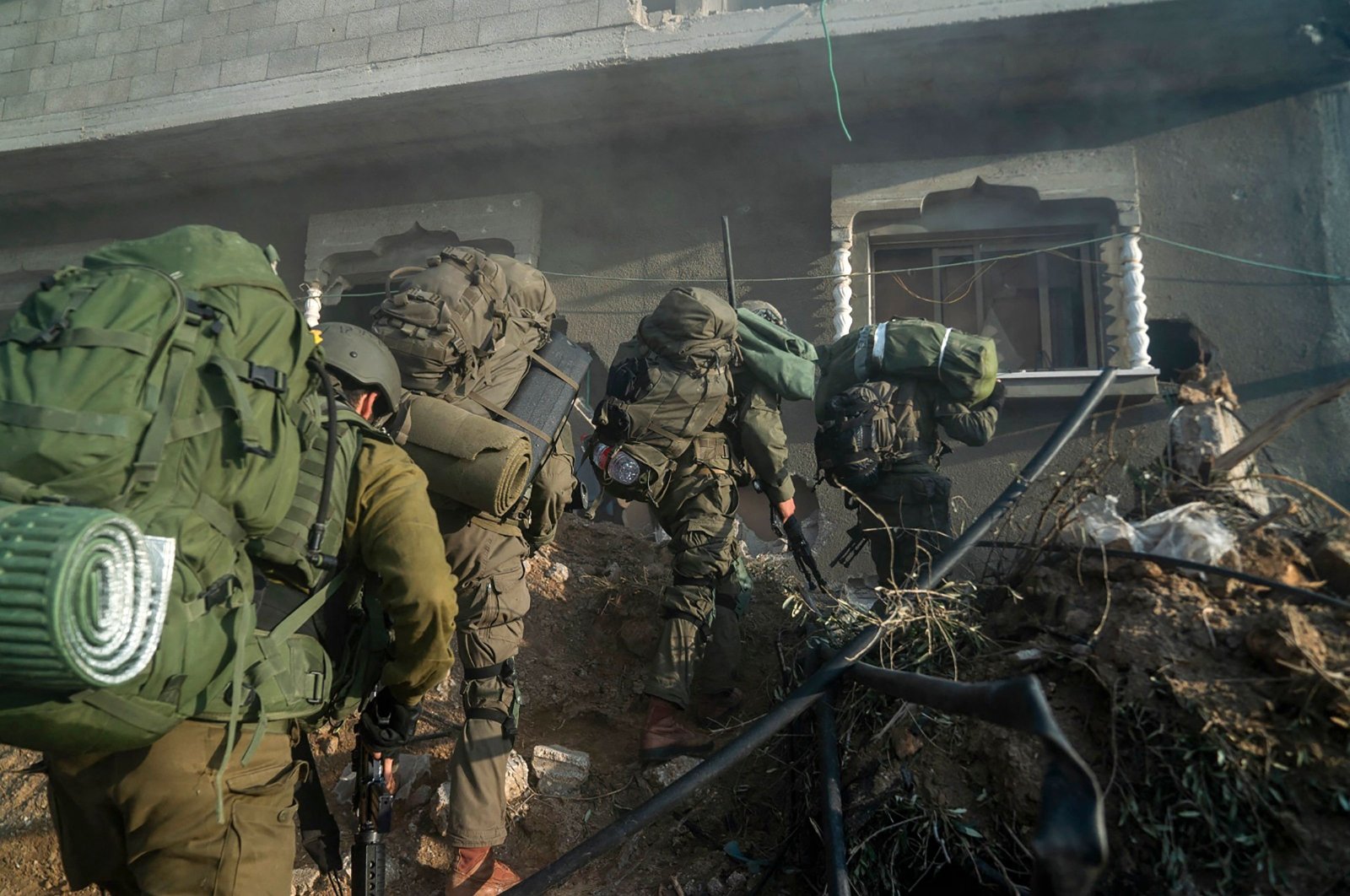 Invading Israeli troops operate inside the Gaza Strip, Palestine, Dec. 28, 2023. (AFP Photo)