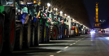 Tractors line up as German farmers take part in a protest against the cut of vehicle tax subsidies, near the Victory Column, Berlin, Germany, Jan. 7, 2024. (Reuters Photo)