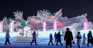 Tourists visit the annual Harbin Ice and Snow World, Harbin, China, Jan. 2,  2024. (EPA Photo)