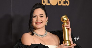 U.S. actress Lily Gladstone poses with the award for Best Performance by a Female Actor in a Motion Picture - Drama for "Killers of the Flower Moon" in the press room during the 81st annual Golden Globe Awards, Beverly Hills, California, U.S., Jan. 7, 2024. (AFP Photo)