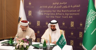 Presidency of Religious Affairs (Diyanet) head Ali Erbaş (L) signs the protocol with Saudi Minister of Hajj and Umrah Tawfig al-Rabiah, Jeddah, Saudi Arabia, Jan. 7, 2024. (AA Photo)
