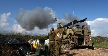An Israeli artillery unit fires toward a target in Lebanon from an undisclosed location at the Lebanon-Israel border, Israel, Jan. 4, 2024. (EPA Photo)