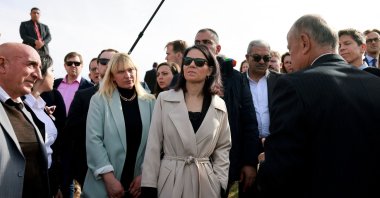 German Foreign Minister Annalena Baerbock (Center) meets with villagers during her visit to al-Mazraa ash-Sharqiya village near the city of Ramallah in the occupied West Bank on Jan. 8, 2024. (AFP Photo)