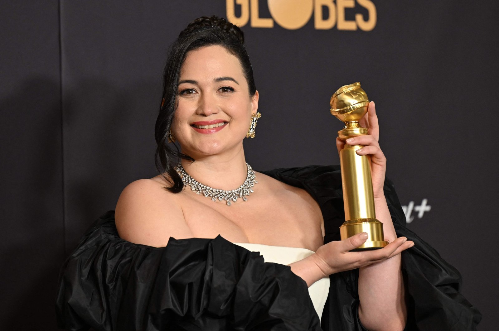 U.S. actress Lily Gladstone poses with the award for Best Performance by a Female Actor in a Motion Picture - Drama for &quot;Killers of the Flower Moon&quot; in the press room during the 81st annual Golden Globe Awards, Beverly Hills, California, U.S., Jan. 7, 2024. (AFP Photo)
