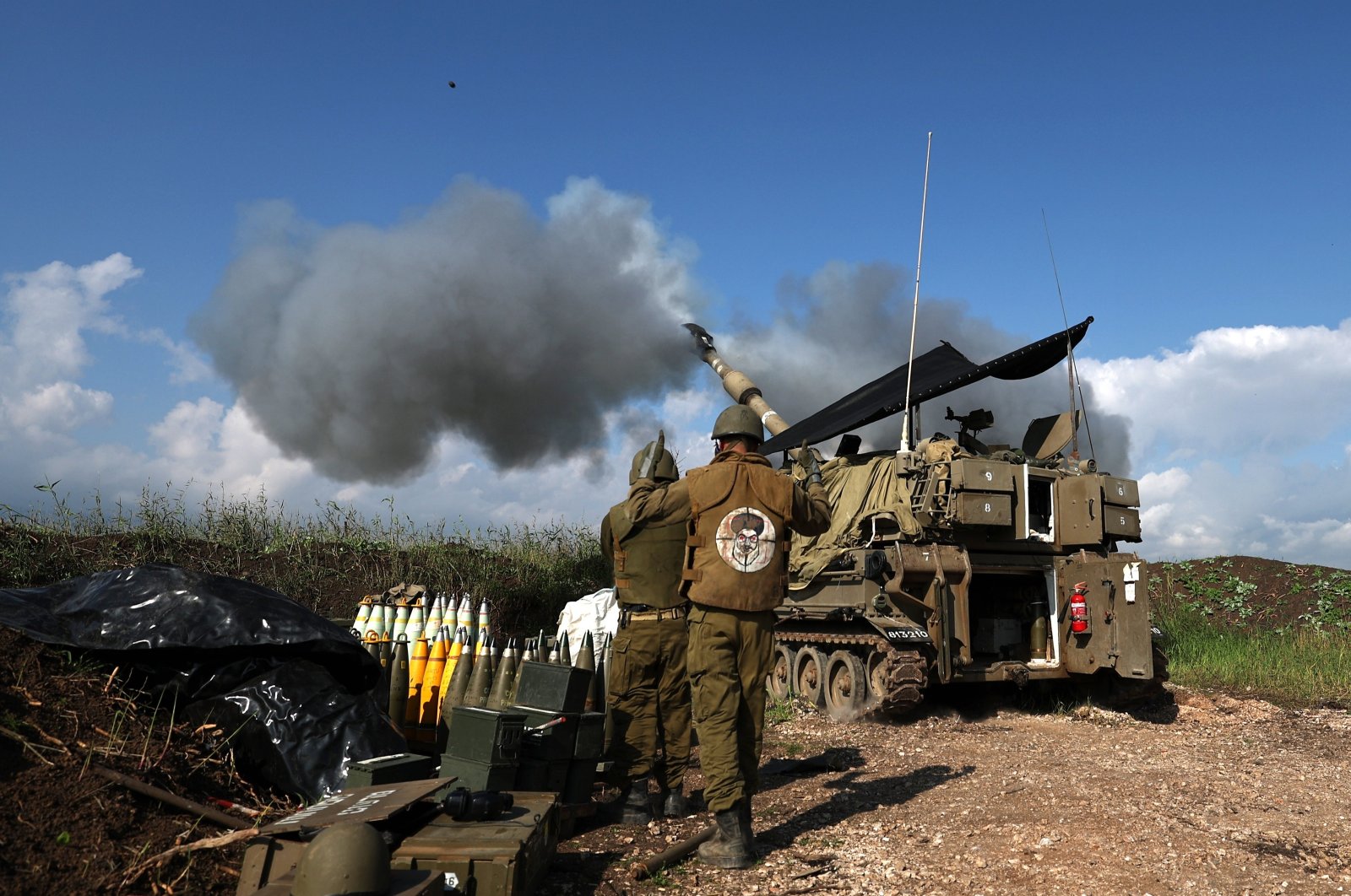 An Israeli artillery unit fires toward a target in Lebanon from an undisclosed location at the Lebanon-Israel border, Israel, Jan. 4, 2024. (EPA Photo)