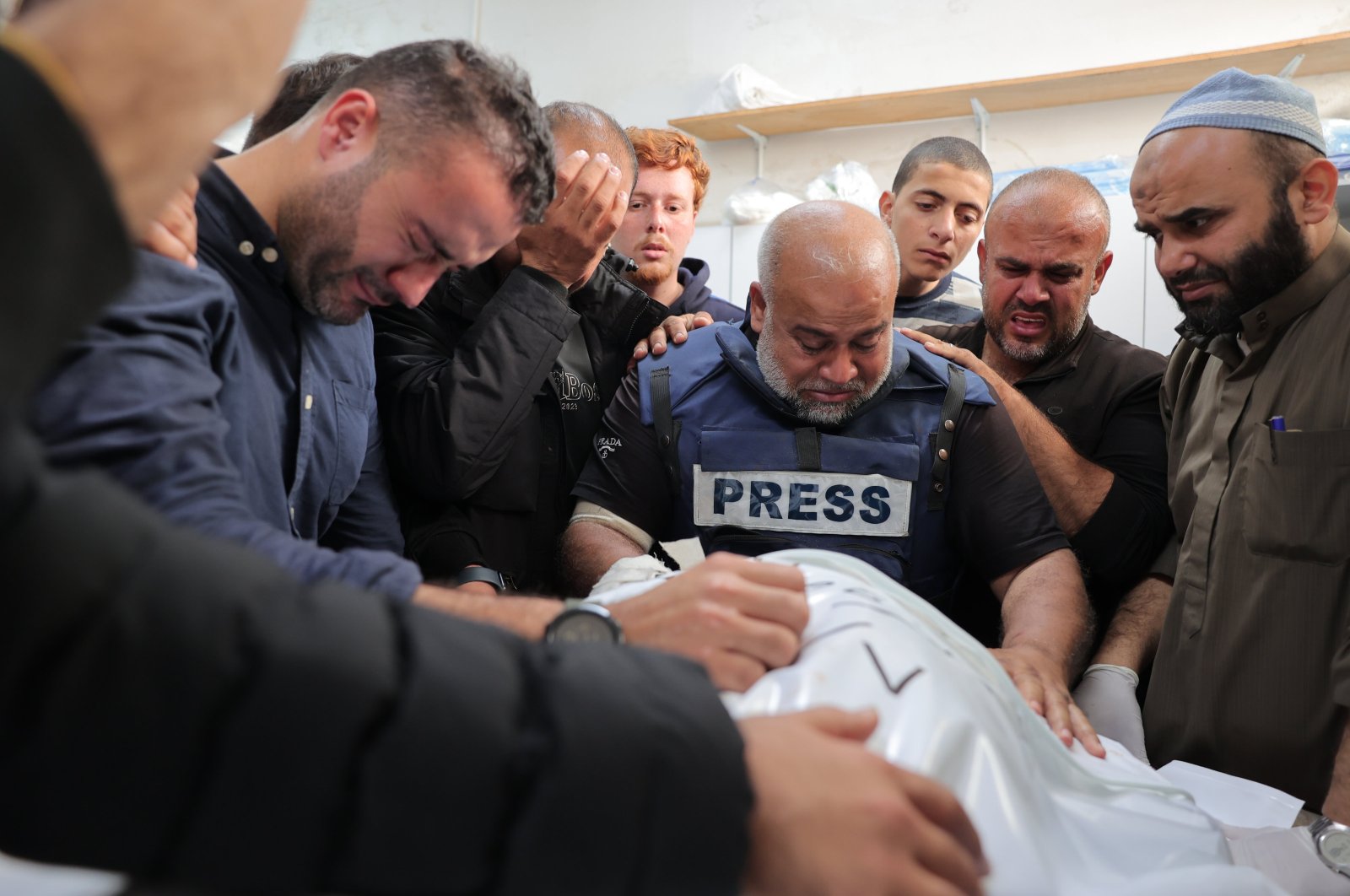 Al Jazeera&#039;s bureau chief in Gaza Wael al-Dahdouh (C) mourns his son Hamza, who was killed in an Israeli airstrike in Rafah, Gaza Strip, Palestine, Jan. 7, 2024. (AFP Photo)