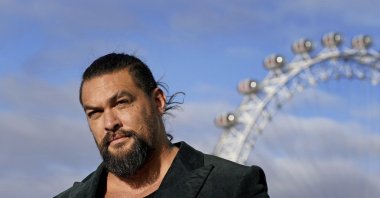 Jason Momoa poses during a photocall for &quot;Aquaman and the Lost Kingdom,&quot; at Park Plaza Hotel in Westminster Bridge, London, U.K., Dec. 11, 2023. (AP Photo)