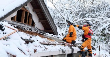Firefighters search for missing persons after a powerful earthquake struck the region in Suzu, Ishikawa Prefecture, Japan, Jan. 8, 2024. (EPA Photo)