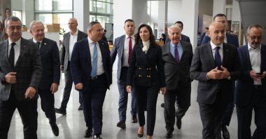 Central Bank of the Republic of Türkiye (CBRT) Governor Hafize Gaye Erkan (C) arrives for a meeting with exporters, in Istanbul, Türkiye, Dec. 13, 2023. (IHA Photo)