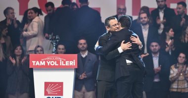 Republican People's Party (CHP) Chair Özgür Özel (L) embraces Istanbul Mayor Ekrem Imamoğlu after he announces his rerun for upcoming local elections during a rally in Istanbul, Türkiye, Jan. 5, 2024. (AA Photo)