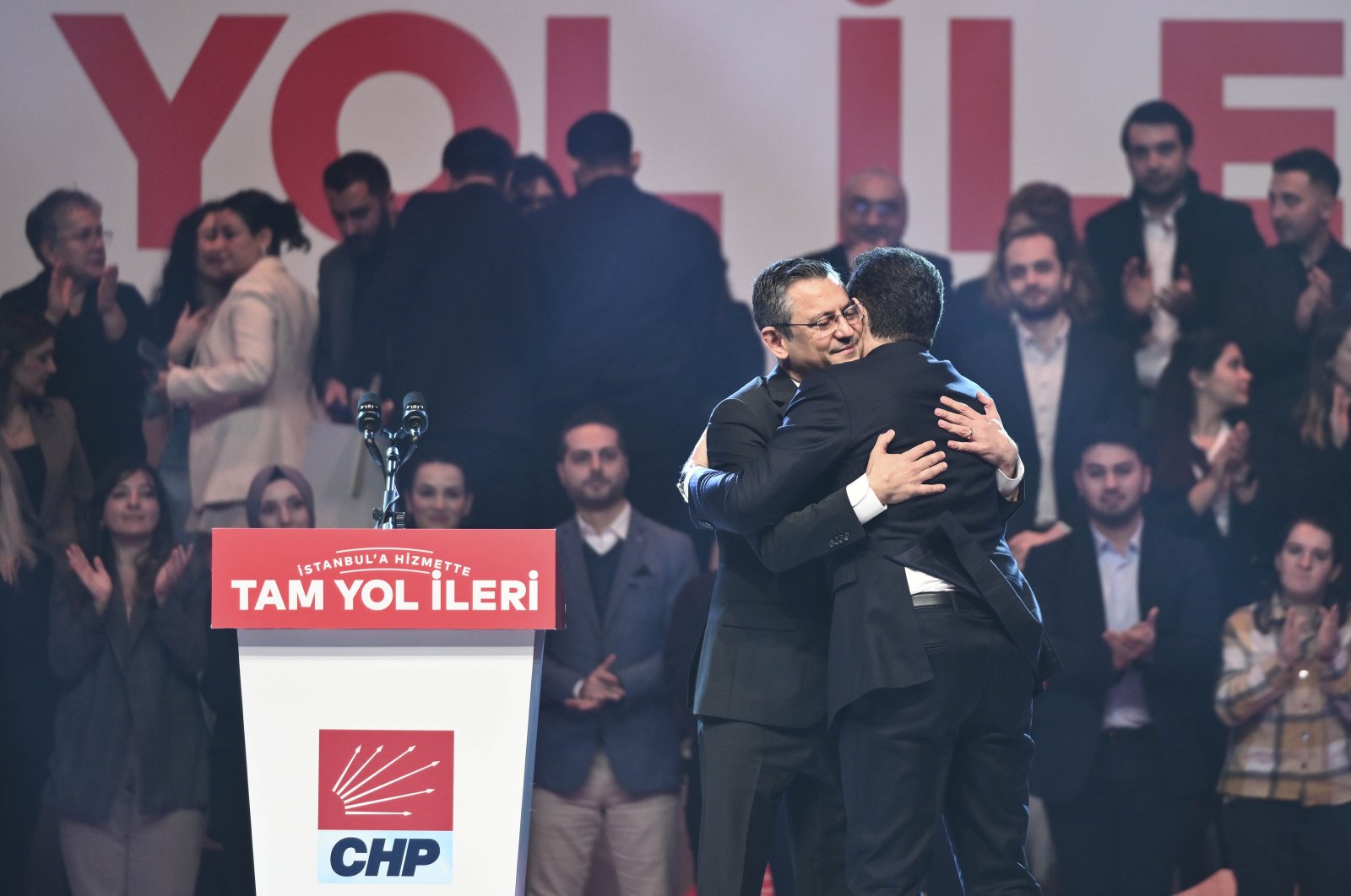 Republican People&#039;s Party (CHP) Chair Özgür Özel (L) embraces Istanbul Mayor Ekrem Imamoğlu after he announces his rerun for upcoming local elections during a rally in Istanbul, Türkiye, Jan. 5, 2024. (AA Photo)