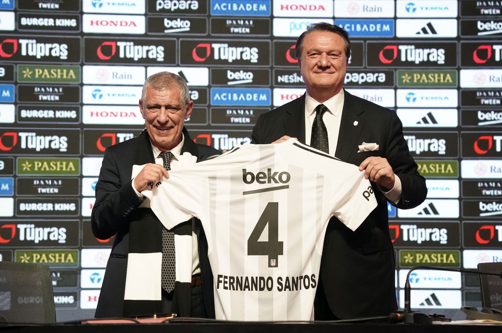 Incoming Beşiktaş coach Fernando Santos (L) is presented at the Tüpraş Stadium by club President Hasan Arat, Istanbul, Türkiye, Jan. 9, 2024. (IHA Photo)