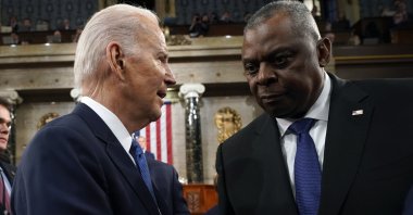U.S. President Joe Biden (L) speaks to Defense Secretary Lloyd Austin at the US Capitol in Washington, D.C., U.S., Feb. 7, 2023. (Getty Images)