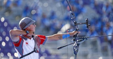 Türkiye&#039;s Mete Gazoz in action during the final match of the Men&#039;s Individual Archery event of the Tokyo 2020 Olympic Games at the Yumenoshima Park, Tokyo, Japan, July 31, 2021. (EPA Photo)