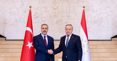 Foreign Minister Hakan Fidan (L) shakes hands with Tajik Foreign Minister Sirojiddin Muhriddin, Dushanbe, Tajikistan, Jan. 10, 2024. (AA Photo)