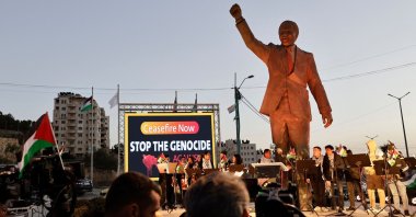 The statue of late South African President Nelson Mandela stands in Ramallah on the eve of South Africa&#039;s "genocide" case against Israel goes to the International Court of Justice, Jan. 10, 2024. (AFP Photo)