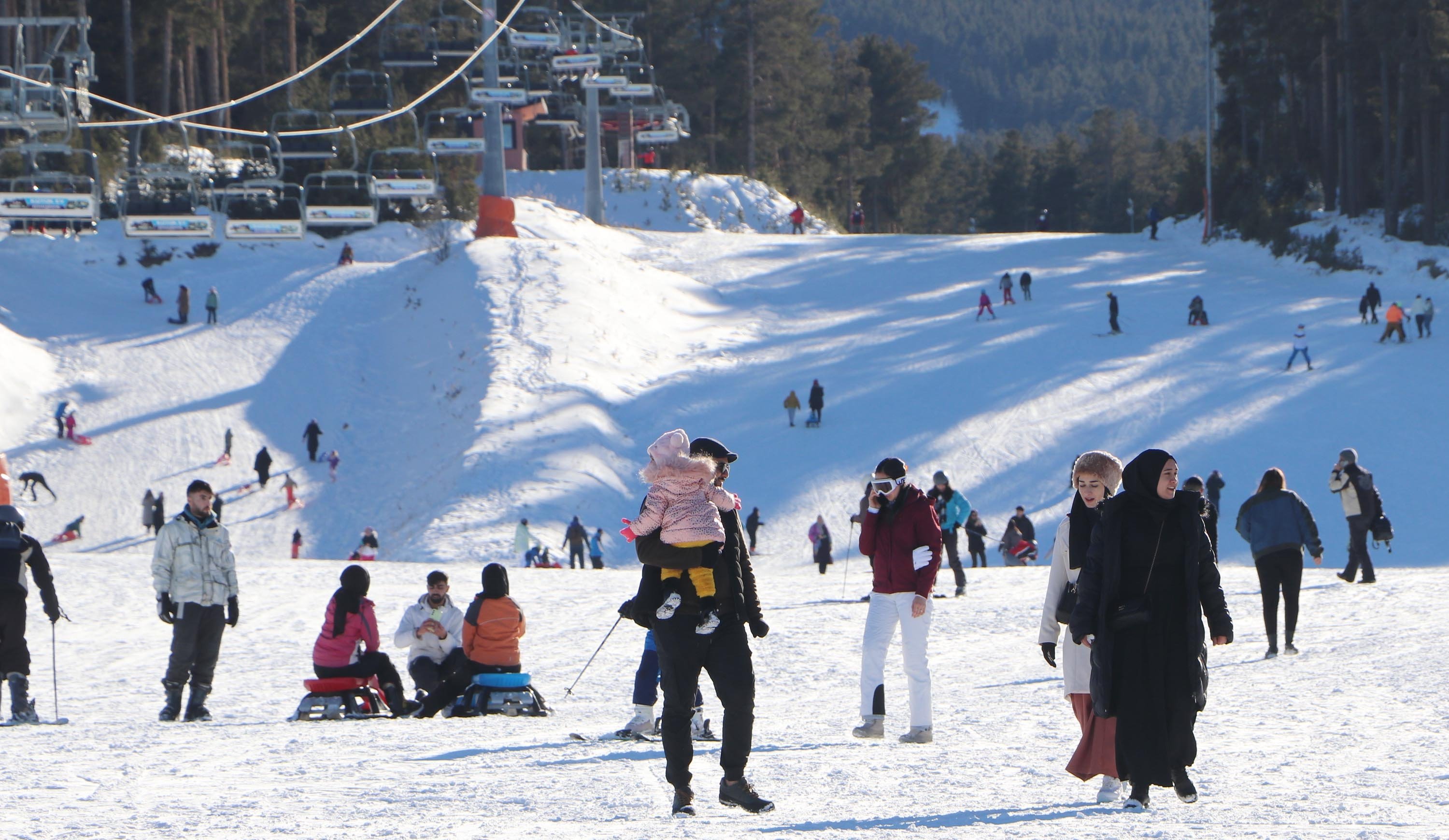Visitors are seen enjoy skiing at Sarıkamış Ski Center, Kars, Türkiye, Jan. 10, 2023. (DHA Photo)