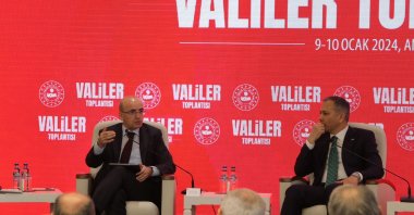 Treasury and Finance Minister Mehmet Şimşek (L) and Interior Minister Ali Yerlikaya attend the governors meeting in the capital Ankara, Türkiye, Jan. 9, 2024. (AA Photo)