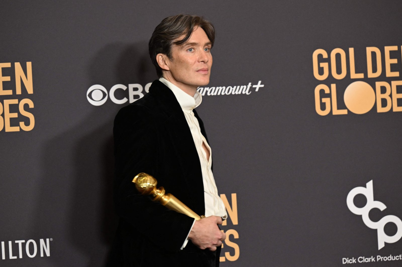 Irish actor Cillian Murphy poses in the press room with the award for Best Performance by a Male Actor in a Motion Picture - Drama for &quot;Oppenheimer&quot; during the 81st annual Golden Globe Awards in Beverly Hills, California, U.S., Jan. 7, 2024. (AFP Photo)