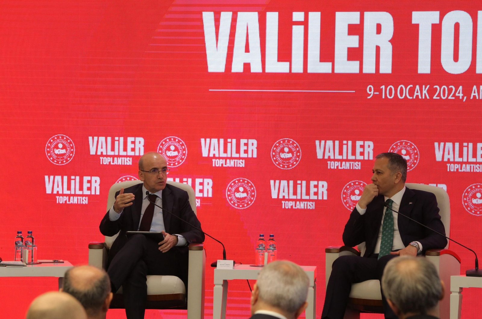 Treasury and Finance Minister Mehmet Şimşek (L) and Interior Minister Ali Yerlikaya attend the governors meeting in the capital Ankara, Türkiye, Jan. 9, 2024. (AA Photo)