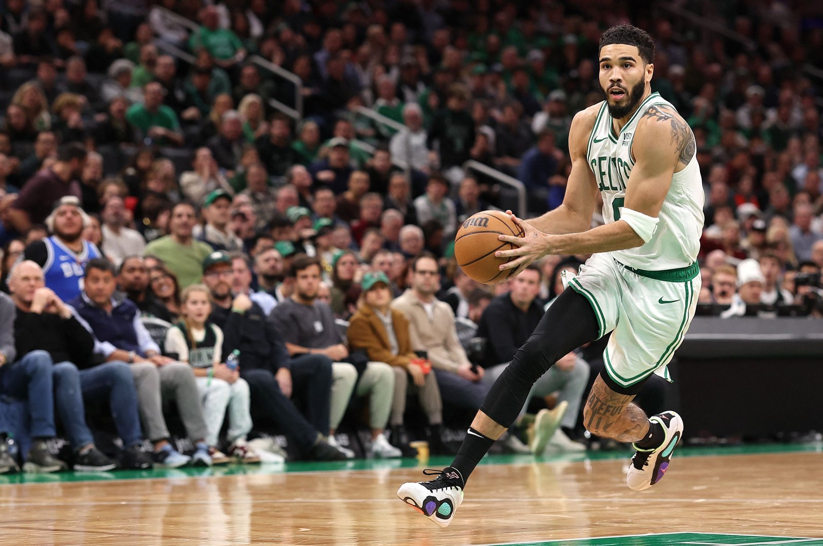 Boston Celtics&#039; Jayson Tatum drives to the basket against the Minnesota Timberwolves at TD Garden, Boston, U.S., Jan. 10, 2024. (AFP Photo)