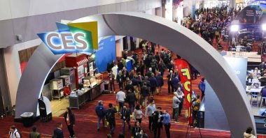 Attendees walk under a CES sign during CES 2024 at the Las Vegas Convention Center, in Las Vegas, Nevada, U.S., Jan. 10, 2024. (AFP Photo)