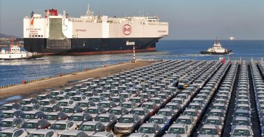 The photo shows electric cars for export waiting to be loaded on the &quot;BYD Explorer NO.1,&quot; a domestically manufactured vessel intended to export Chinese automobiles, at Yantai port, in eastern Shandong province, China, Jan. 10, 2024. (AFP Photo)