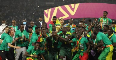 Senegal players celebrate with the trophy after winning the 2021 Africa Cup of Nations final match against Egypt at the Paul Biya &quot;Olembe&quot; Stadium, Yaounde, Cameroon, Feb. 6, 2023. (Getty Images Photo)