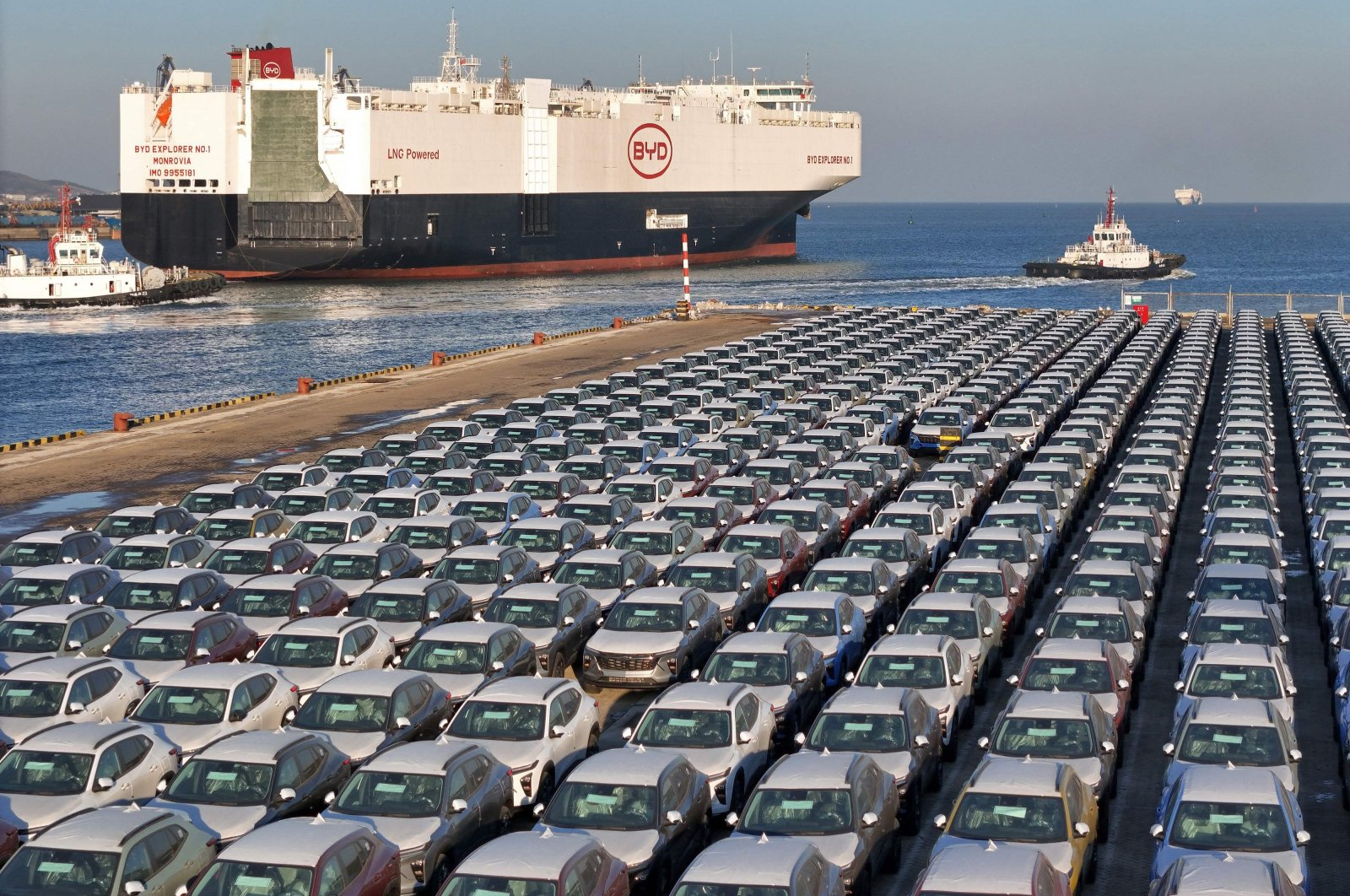 The photo shows electric cars for export waiting to be loaded on the &quot;BYD Explorer NO.1,&quot; a domestically manufactured vessel intended to export Chinese automobiles, at Yantai port, in eastern Shandong province, China, Jan. 10, 2024. (AFP Photo)