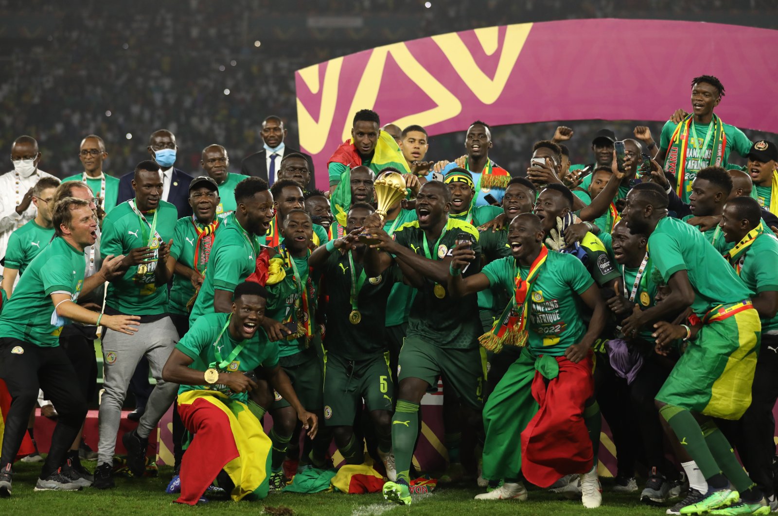 Senegal players celebrate with the trophy after winning the 2021 Africa Cup of Nations final match against Egypt at the Paul Biya &quot;Olembe&quot; Stadium, Yaounde, Cameroon, Feb. 6, 2023. (Getty Images Photo)