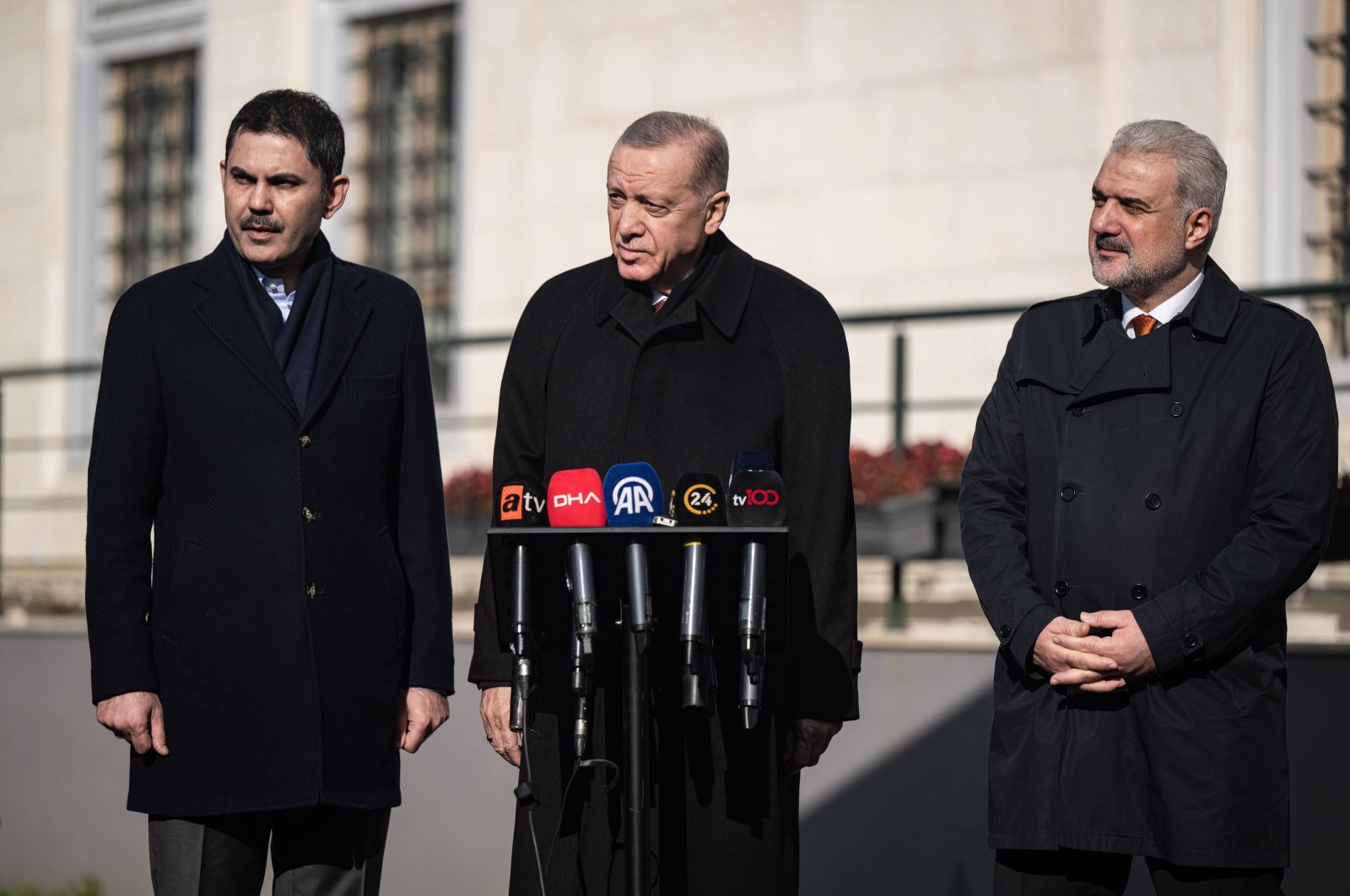 President Recep Tayyip Erdoğan speaks to reporters as he stands next to his party&#039;s Istanbul candidate Murat Kurum (L) and Istanbul branch Chair Osman Nuri Kabaktepe (R), Istanbul, Türkiye, Jan. 12, 2024. (AA Photo)