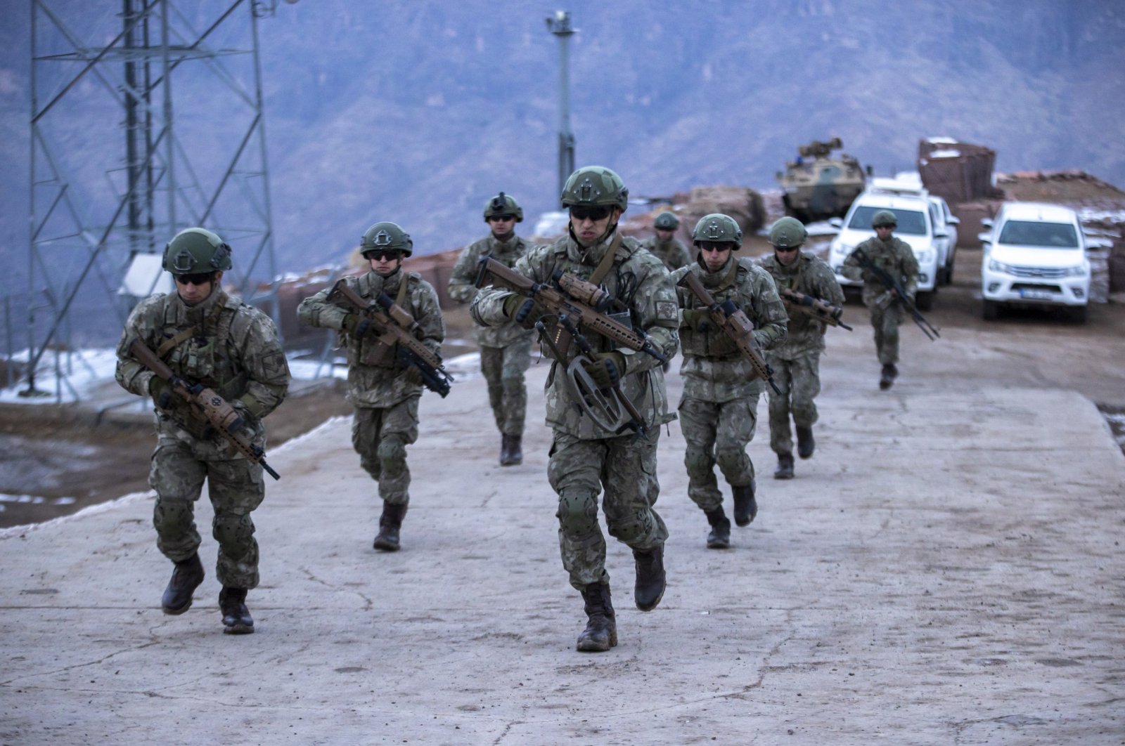 Soldiers run to a helicopter, in Hakkari, southeastern Türkiye, Jan. 14, 2023. (AA File Photo)