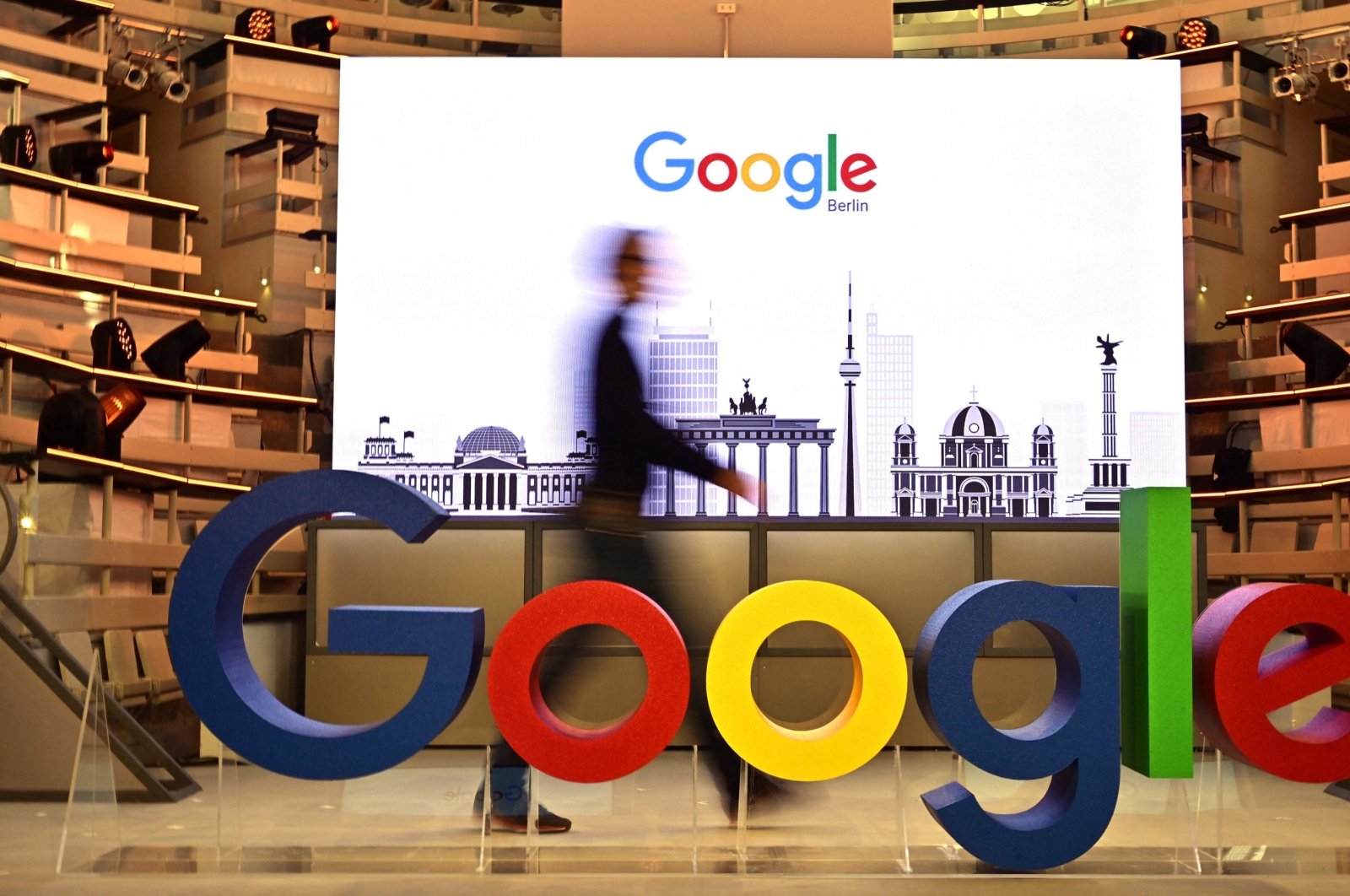 A technician passes by the logo of U.S. internet search giant Google during the opening day of a new office in Berlin, Germany, Jan. 22, 2019. (AFP File Photo)