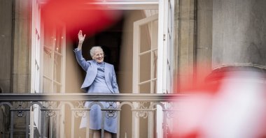 Denmark&#039;s Queen Margrethe II waves from the balcony during celebrations for her 83rd birthday, at Amalienborg Castle in Copenhagen, Denmark, April 16, 2023. (AP Photo)
