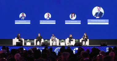 Energy and Natural Resources Minister Alparslan Bayraktar (R) speaks during the Libyan Energy and Economy Summit, in Tripoli, Libya, Jan. 13, 2024. (AA Photo)