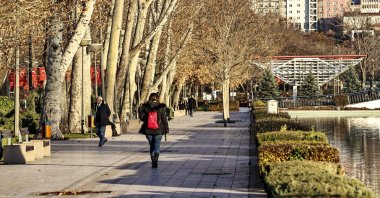 Citizens walking on a sunny December day in the capital, Ankara, Türkiye, Dec. 26, 2023. (AA Photo)