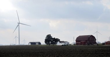 Wind turbines are scattered across farmland near Port Austin, Michigan, U.S., Dec. 3, 2014. (AP Photo)