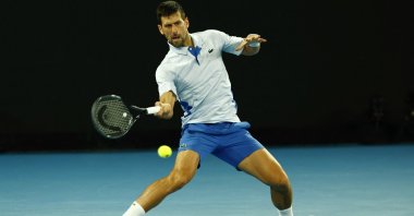 Serbia's Novak Djokovic in action during his Australian Open first round match against Croatia's Dino Prizmic, Melbourne, Australia, Jan. 14, 2024. (Reuters Photo)