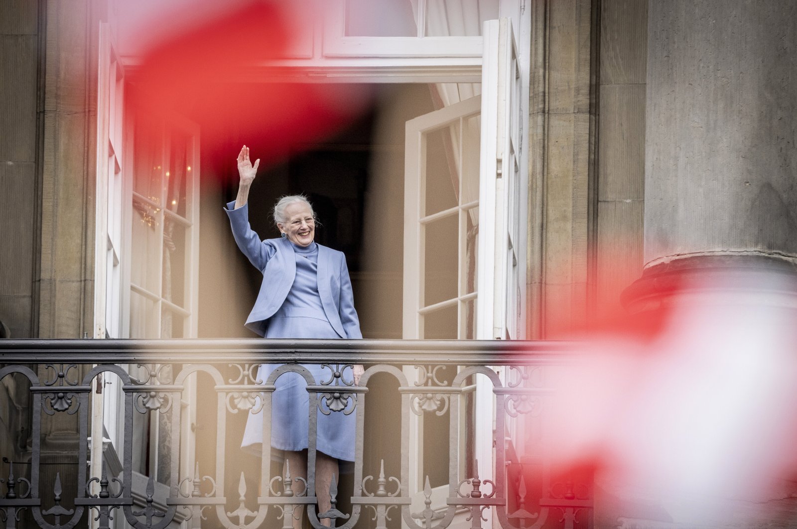Denmark&#039;s Queen Margrethe II waves from the balcony during celebrations for her 83rd birthday, at Amalienborg Castle in Copenhagen, Denmark, April 16, 2023. (AP Photo)