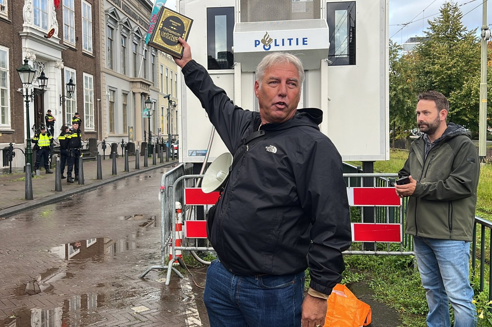 Edwin Wagensveld, the leader of PEGIDA in the Netherlands, desecrates the Quran in front of Türkiye&#039;s Embassy in The Hague, the Netherlands, Sept. 23, 2023. (AA Photo)