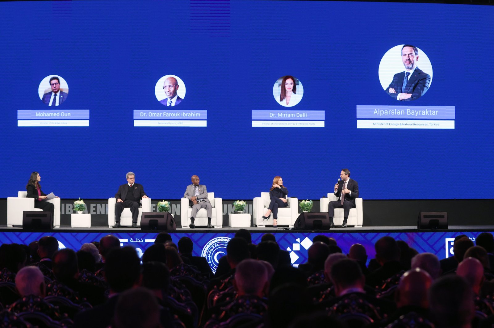 Energy and Natural Resources Minister Alparslan Bayraktar (R) speaks during the Libyan Energy and Economy Summit, in Tripoli, Libya, Jan. 13, 2024. (AA Photo)