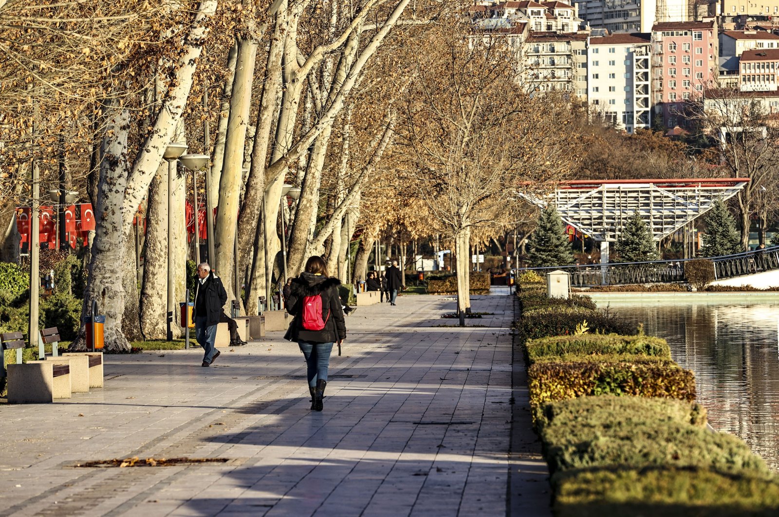 Citizens walking on a sunny December day in the capital, Ankara, Türkiye, Dec. 26, 2023. (AA Photo)