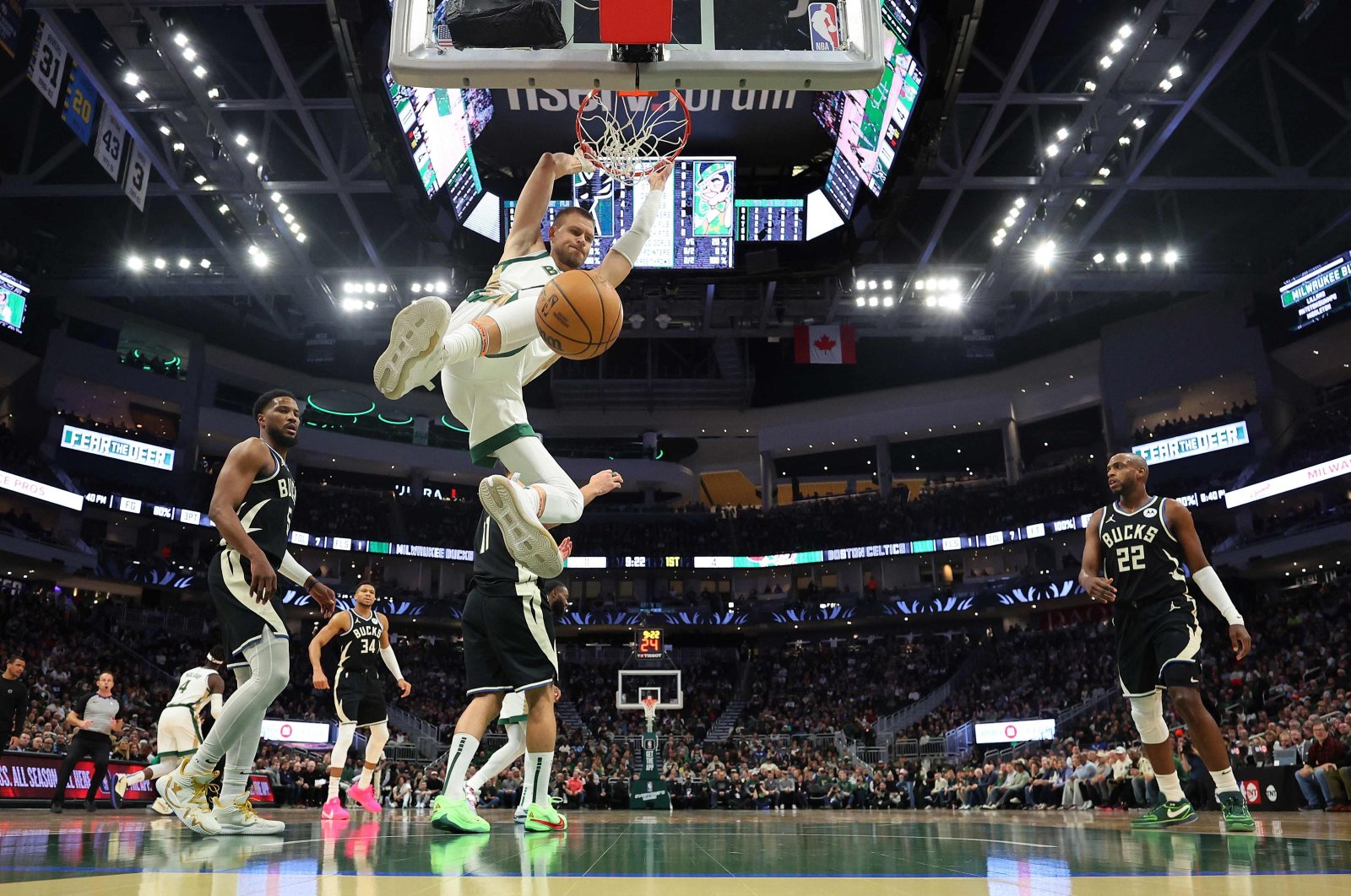 Celtics&#039; Kristaps Porzingis dunks against the Milwaukee Bucks during an NBA game, Milwaukee, Wisconsin, U.S., Jan. 11, 2024. (AFP Photo)