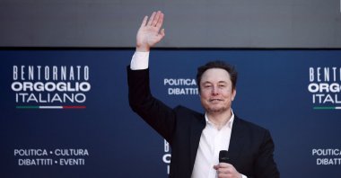 Tesla and SpaceX&#039;s CEO Elon Musk gestures, as he attends the political festival Atreju organized by Italian Prime Minister Giorgia Meloni&#039;s right-wing Brothers of Italy party, Rome, Italy, Dec. 16, 2023. (Reuters Photo)