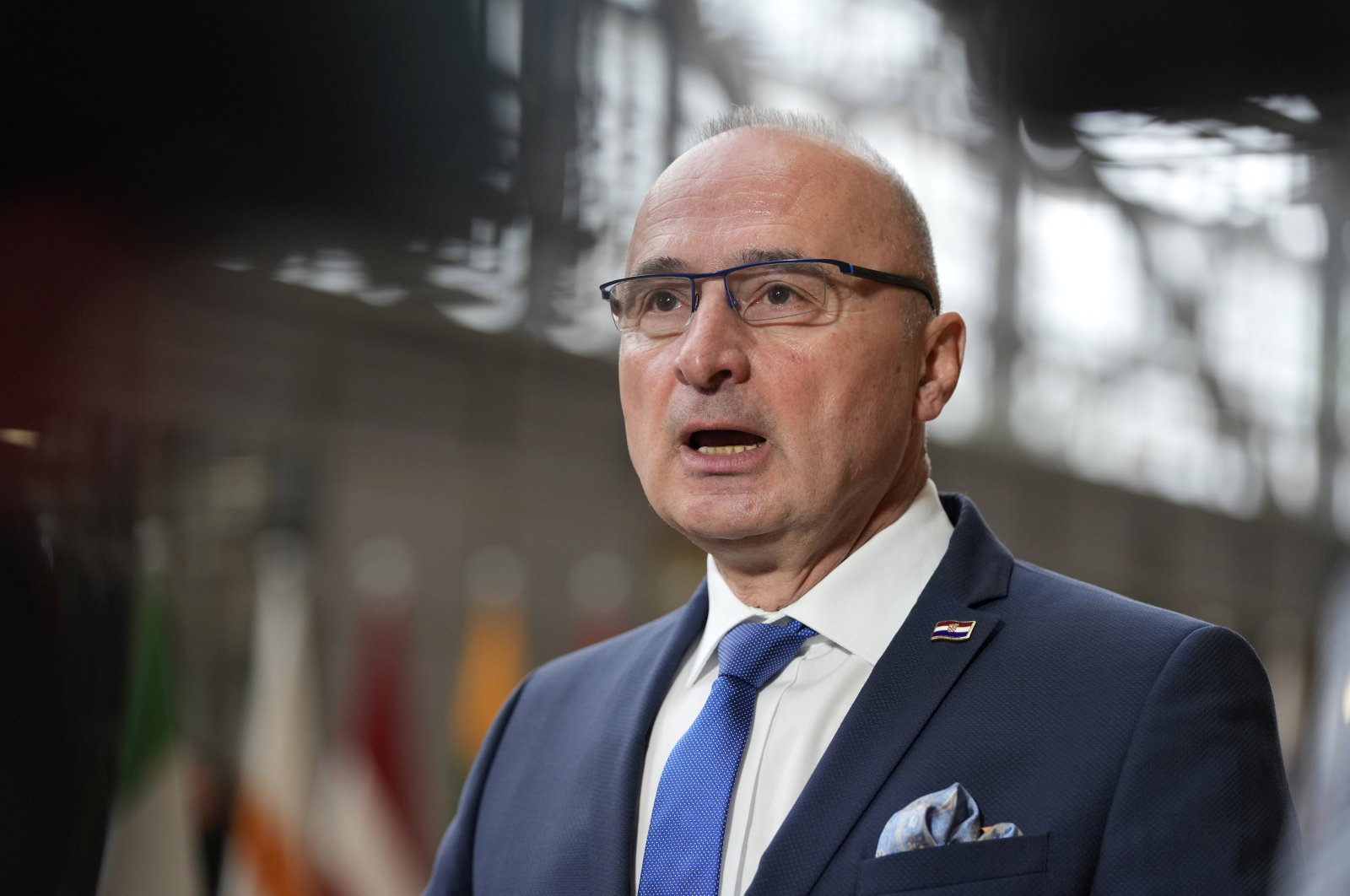 Croatia&#039;s Foreign Minister Gordan Grlic Radman speaks with the media as he arrives for a meeting of EU foreign ministers at the European Council building in Brussels, Monday, May 22, 2023. (AP File Photo)