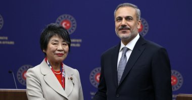 Foreign Minister Hakan Fidan (R) and Japanese Foreign Minister Yoko Kamikawa (L) shake hands during a news conference after their meeting in Ankara, Turkey, Jan. 16, 2024. (EPA Photo)