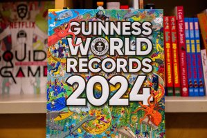 A &quot;Guinness World Records 2024&quot; book. (AFP Photo)